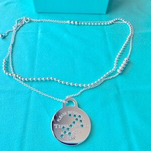 Tiffany&Co Zodiac Sagittarius sterling silver 925 necklace ,worn 2 min scratches